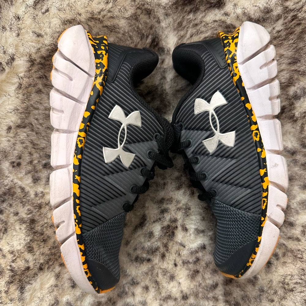 Under Armour Kids Black Sneakers with White Logo and Yellow Accent